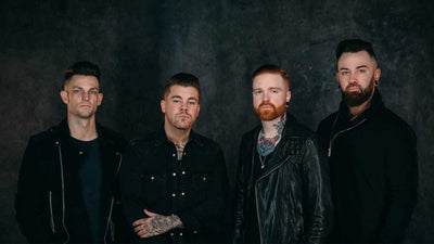 Memphis May Fire band promo in front of studio backdrop