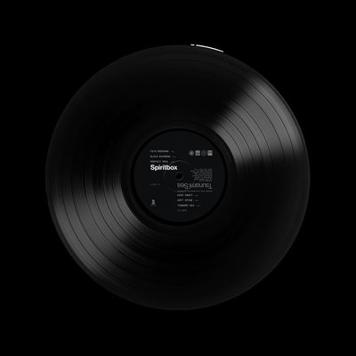 A Standard Vinyl release from Spiritbox, featuring a black vinyl record with white label text detailing track info and the Spiritbox brand name, all set against a solid black background.