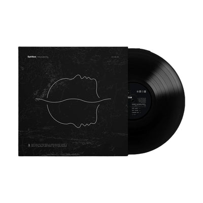 A Spiritbox Standard Vinyl LP is partially slid out of a dark cover with minimalist white line art showing two mirrored faces in profile, connected at the nose, on a textured black background.