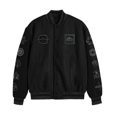 The Spiritbox custom varsity jacket features black buttons, two front pockets, and embroidered white symbols—chenille embroidery and a stitched Sb logo—adorning the chest and sleeves for a standout look.