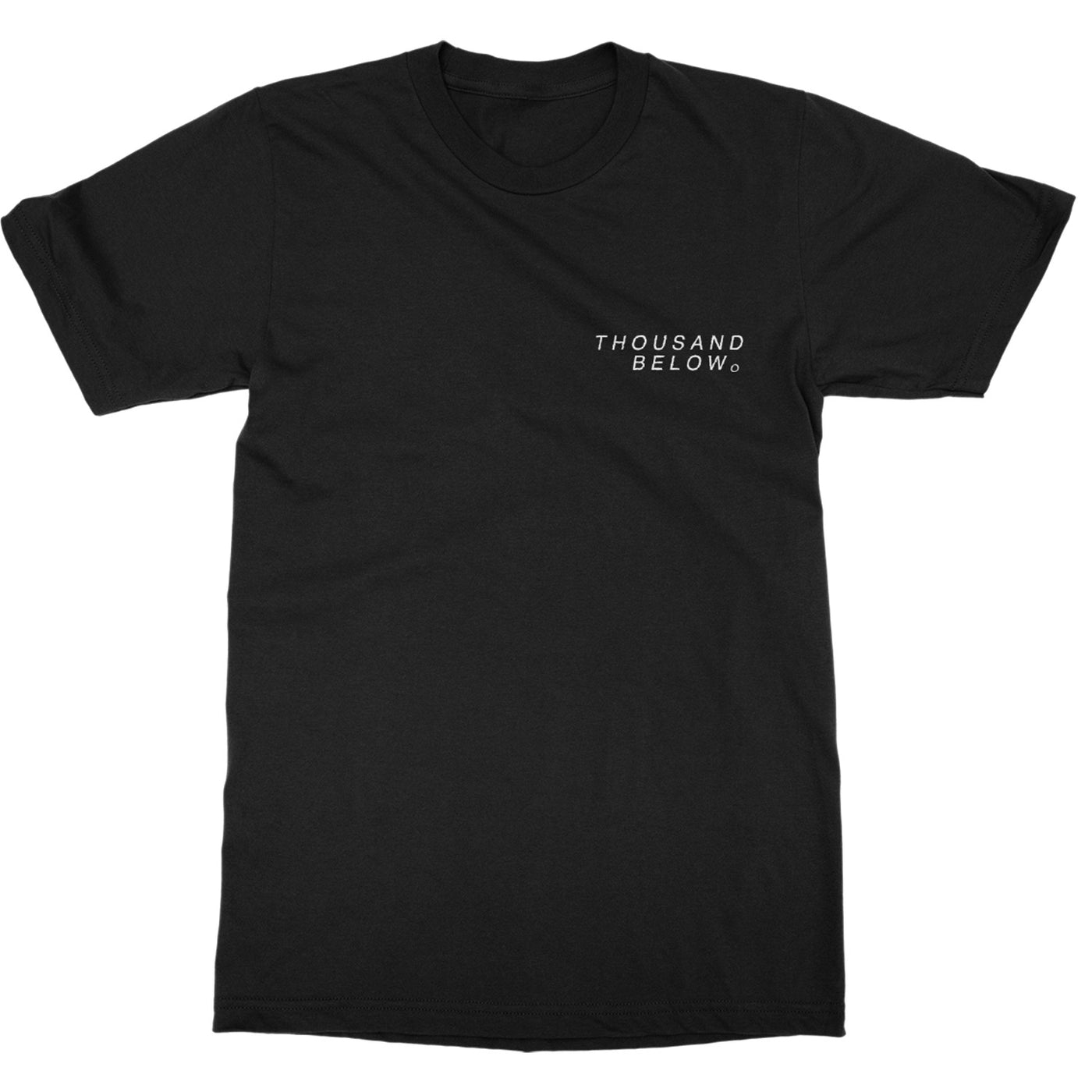 front of black t-shirt with white text printed on the left chest saying "thousand below"