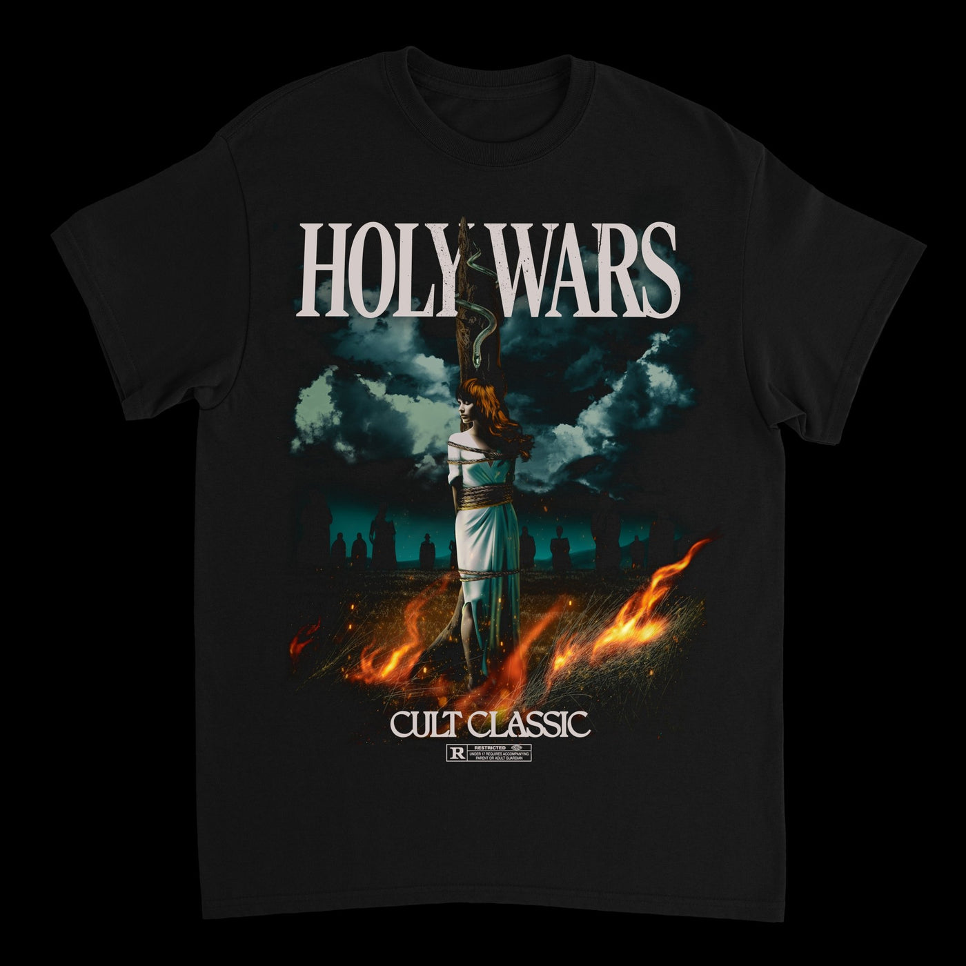 Holy Wars black T-shirt with “HOLY WARS” in bold above a dramatic illustration of a woman at the stake amid stormy skies and ruins, finished with “CULT CLASSIC” below.