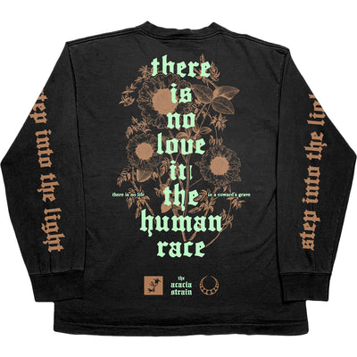 back of The Acacia Strain Human Race Black Long Sleeve. Step into the light text down both sleeves in gold. full center back print of large flowers in gold with "there is no love in the human race" text in teal over the flowers. 